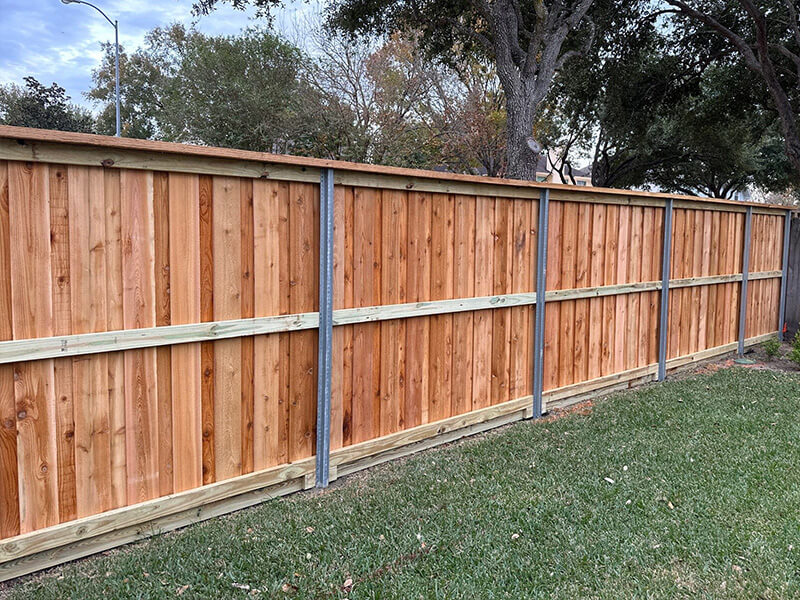 Wood Fence with Metal Posts in Stafford Texas