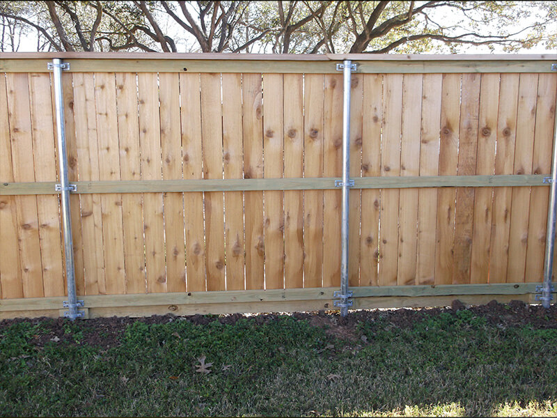 Wood Fence with Metal Posts in Stafford Texas
